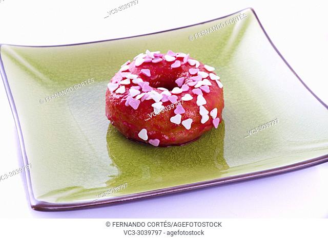 Colorful donut on a plate