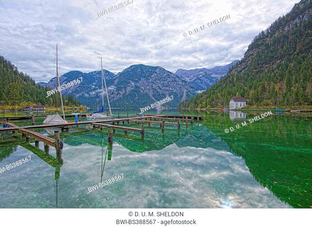 boat bridge on a clear lake in autumn, Plansee, Austria, Tyrol