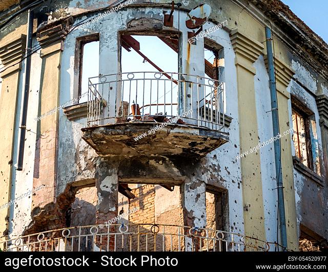 destroyed burnt house with traces of bullets in the walls in Ukraine