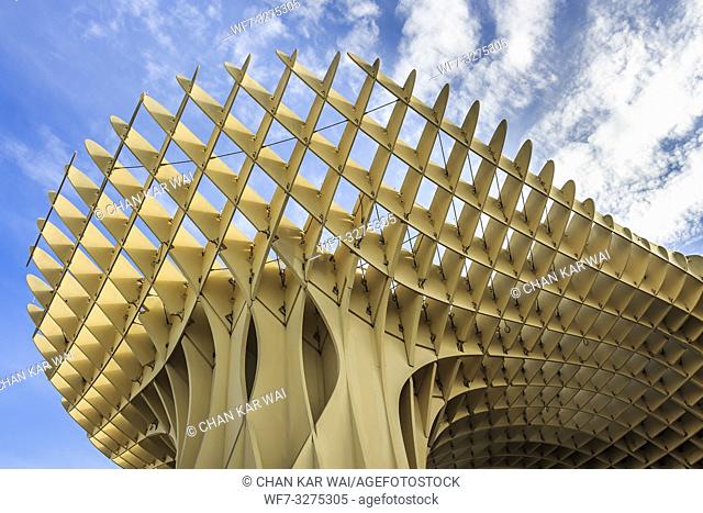 Seville, Spain - Dec 2018: Bottom up view of Mushrooms of Seville , also known as Metropol Parasol. It was designed by the German architect Jurgen Mayer and was...