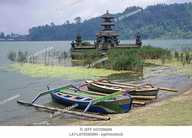Uludanu/ Ulu Danu temple. By lake shore. Buddhist/ Hindu. Pavilion/ bale on water. Outrigger boats