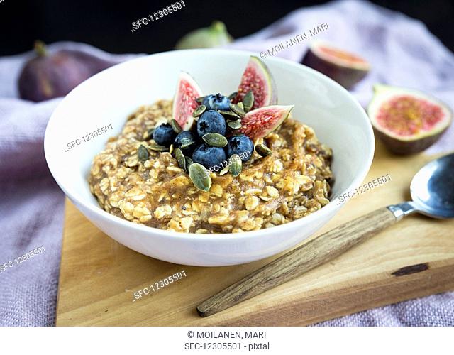 Oatmeal with dates, blueberries, figs and pumpkin seeds