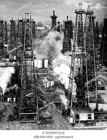 Oil drilling rigs in an oil refinery, Signal Hill, California, USA