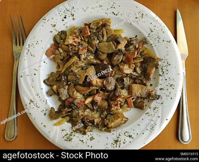 Sauteed of mushrooms and bacon
