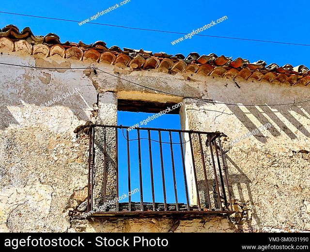 Balcony of house in ruins