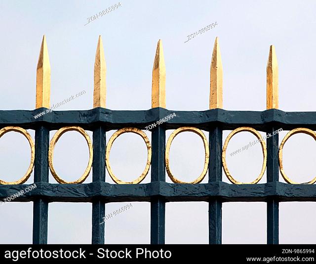 Image of cast iron fence in park