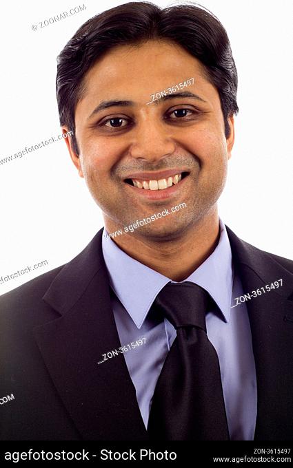 Closeup of smiling Indian business man isolated over white background