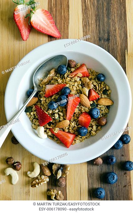 Healthy muesli with fresh fruit and nuts