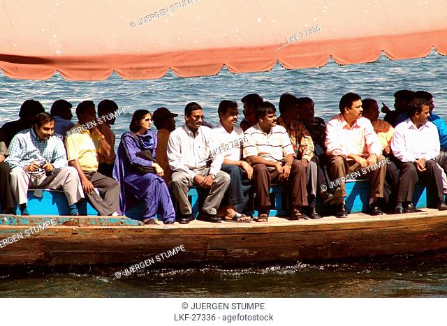 People on an Abra ferry, Dubai, UAE, United Arab Emirates, Middle East, Asia
