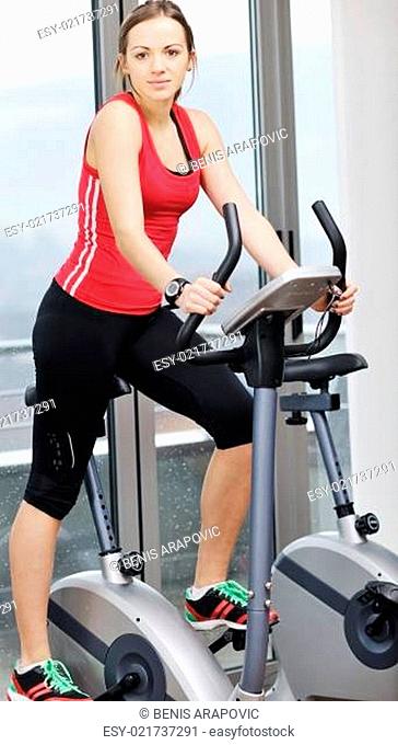 woman workout in fitness club on running track