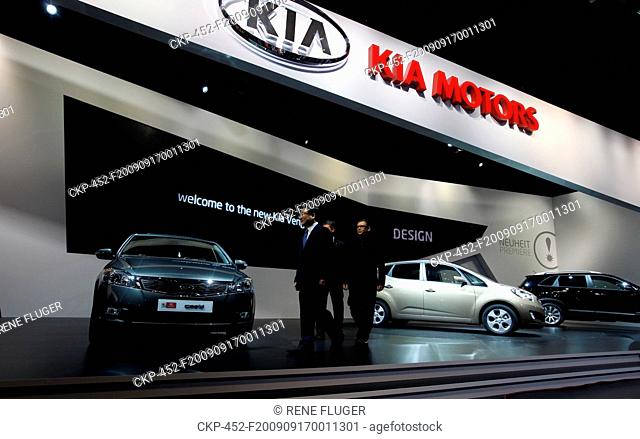 Chief designer of Kia Motors Peter Schreier, back, president of Kia Motors Hyoung-Keun Lee, front left, and Paul Philpott of Kia presented new brand model Kia...