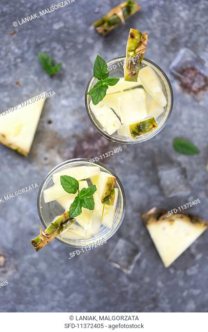 Water flavoured with pineapple and mint