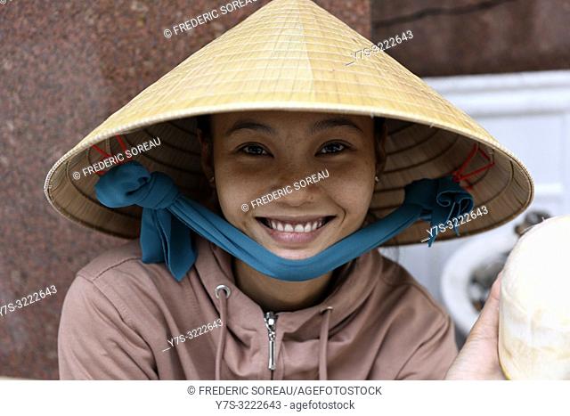 Portrait of a vietnamese woman smiling, Ho Chi Minh City, Vietnam, South East Asia