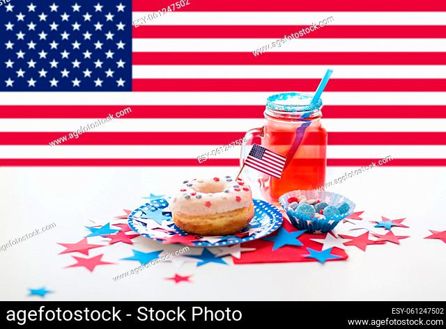 iced donut with american flag decoration and juice
