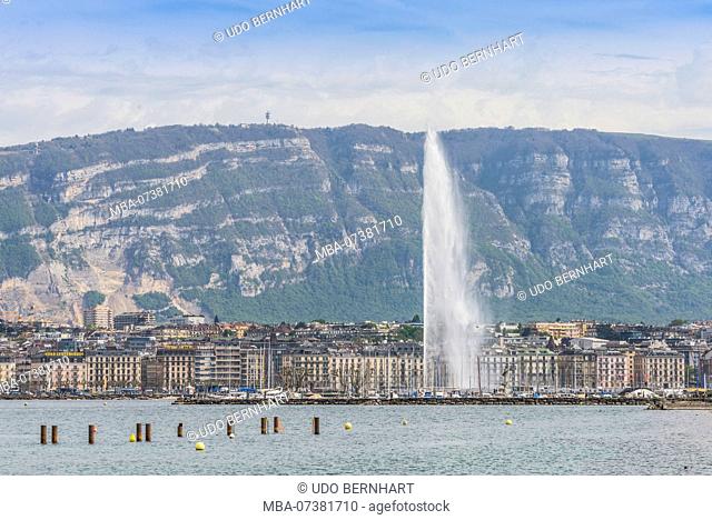 View of lake with fountain Jet d'eau in front of waterfront, Geneva, Canton of Geneva, Western Switzerland, Switzerland