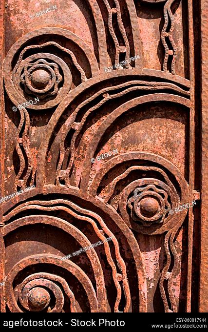 Close up shot of a rusty iron door