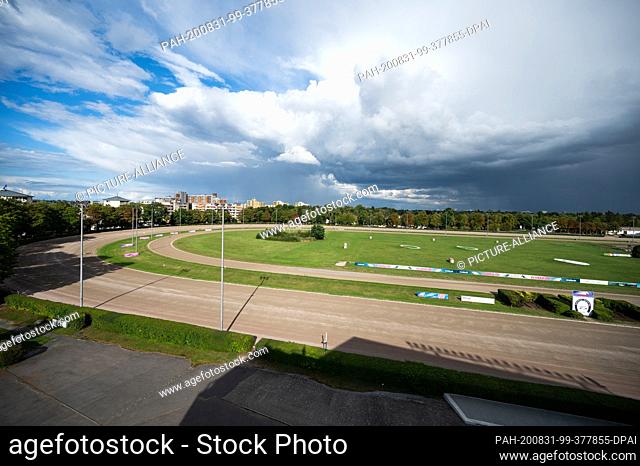 31 August 2020, Berlin: Clouds pass over the trotting course Mariendorf. The trotter derby takes place from September 05th to 20th