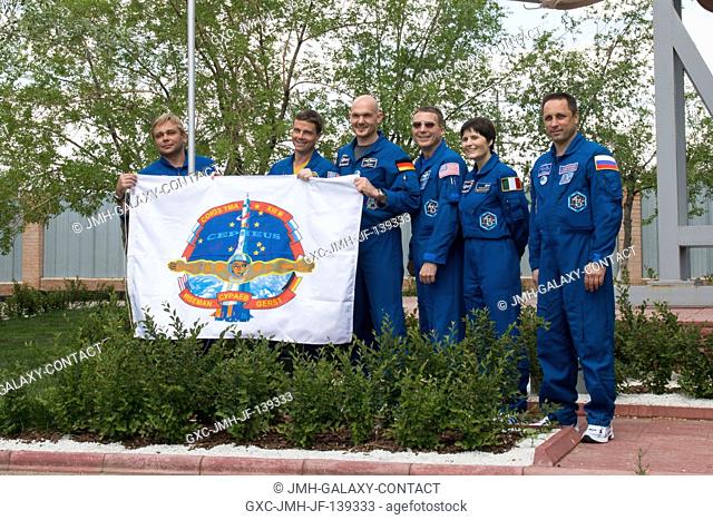 Outside the Korolev Museum at the Baikonur Cosmodrome in Kazakhstan, Expedition 4041 prime crew members Maxim Suraev of the Russian Federal Space Agency...