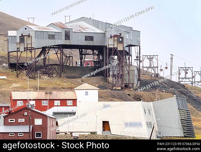 22 August 2023, Norway, Longyearbyen: The old power station on the mountainside. The town on the main island, founded in 1906 as a mining settlement