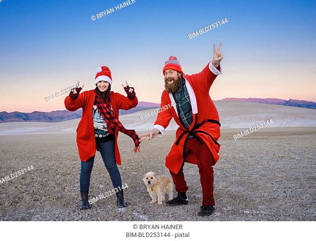 Festive couple celebrating Christmas in the desert