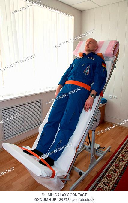 At the Cosmonaut Hotel crew quarters in Baikonur, Kazakhstan, Expedition 4041 Flight Engineer Alexander Gerst of the European Space Agency takes a turn on a...