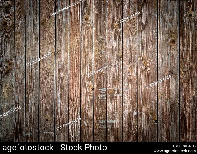 Rustic wood planks background with nice studio lighting and elegant vignetting to draw the attention