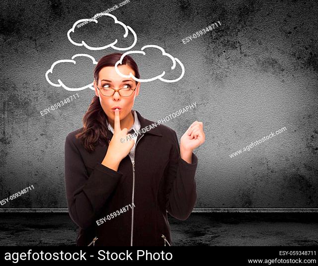 Clouds Drawn Around Head of Young Adult Woman In Front of Wall with Copy Space