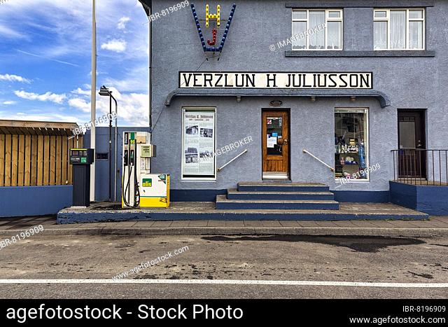 Old shop, grocer's shop with display board and small petrol station by the roadside, Sauðárkrókur, Saudarkrokur, Skagafjörður, Northwest Iceland, Iceland