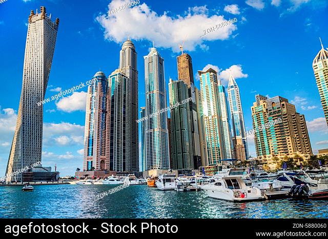 DUBAI, UAE - NOVEMBER 13: Dubai downtown day scene with city lights, luxury new high tech town in United Arab Emirates architecture on November 13