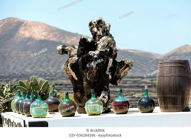 A big bottles with grape wine - malvasia. Lanzarote, Spain