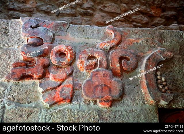 A close-up secion of the colorful stucco frieze inside the Sructure I temple in the ancient Mayan city of Balamku, Mexico