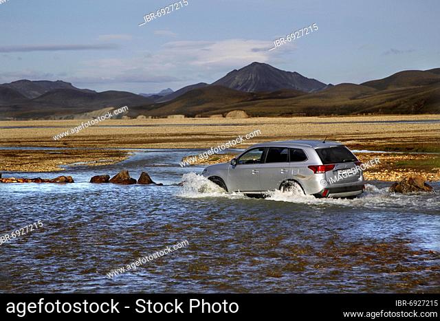 River, ford, off-road vehicle fording, river crossing, lava landscape, highland track, track, vehicle, white Mercedes Sprinter, camper, white dust plume