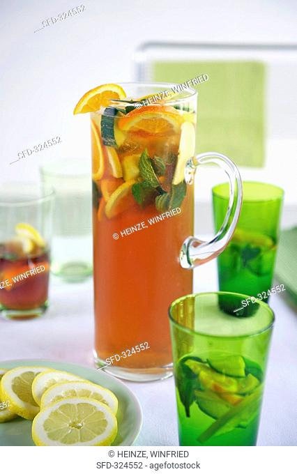 Pimms with lemons, oranges and mint