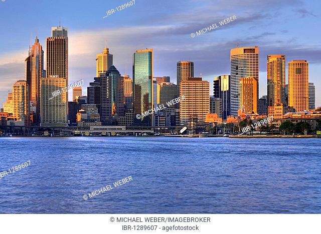 View of Sydney Cove at sunrise, Circular Quay, port, Sydney skyline, Central Business District, Sydney, New South Wales, Australia