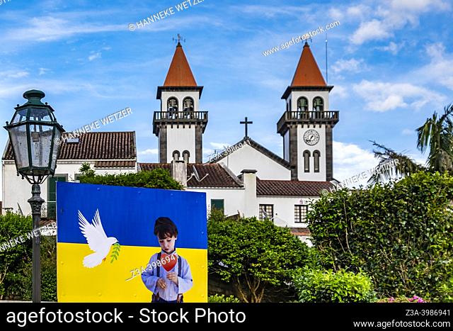 Furnas, Sao Miguel Island, Azores, Portugal - May, 2022: Support to Ukraine in front of the old church (church of Santa Ana) of Furnas