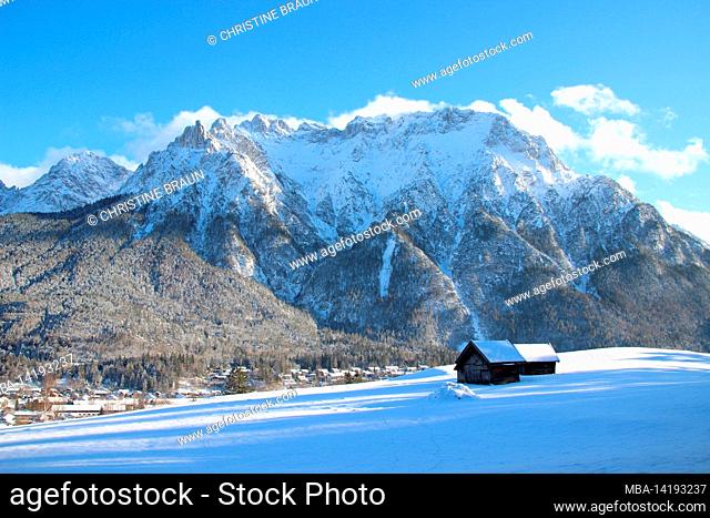 Winter walk near Mittenwald, the Karwendel Mountains all in white, in the foreground the snow-covered meadow, Heustadl, Europe, Germany, Bavaria, Upper Bavaria