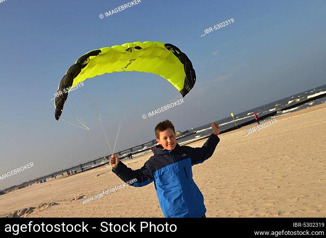 Boy flies a kite