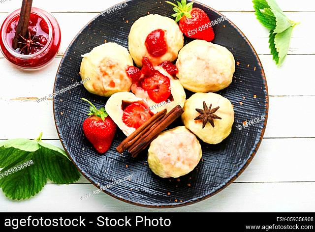 Czech dumplings varenyky with berries.Dumplings with strawberries or knedlik