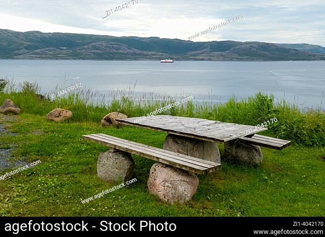 View at fjord and picnic table on the island of Leka, Norway