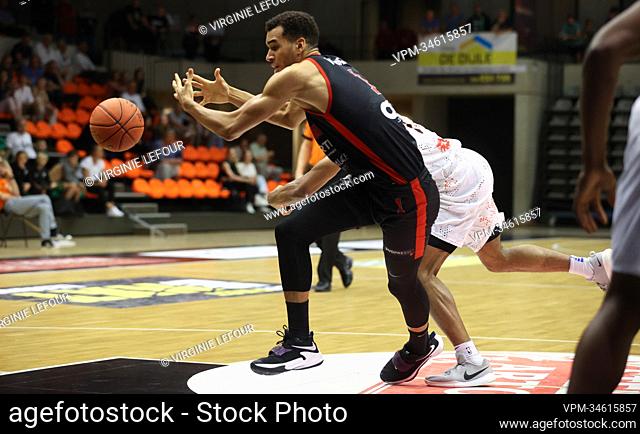 Leuven's KeVaughn Allen and Spirou's Noah Fogang fight for the ball during a basketball match between Leuven Bears and Spirou Charleroi, Saturday 07 May 2022