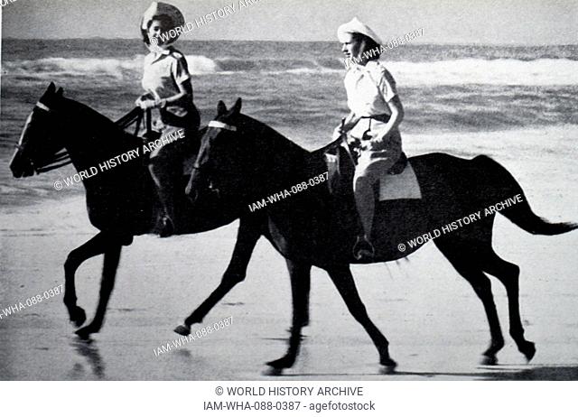 Photograph of Queen Elizabeth II (1926 -) and Princess Margaret (1930-2002) in South Africa. Dated 20th Century