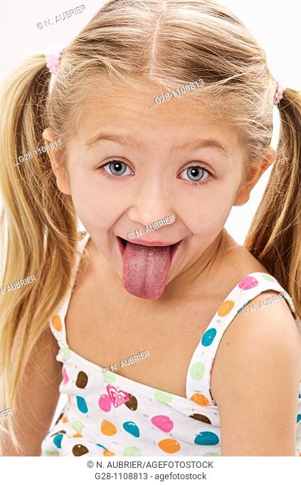 girl 7 pulling her tongue out