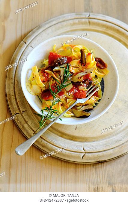 Tagliatelle with slippery Jack mushrooms and tomatoes