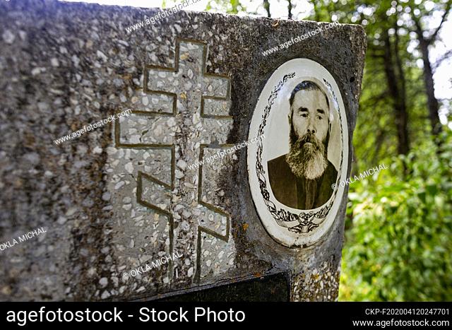 The June 18, 2019, photo of a grave on former cemetery in abandoned territory in Ukraine nearby Chernobyl Nuclear Power Plant