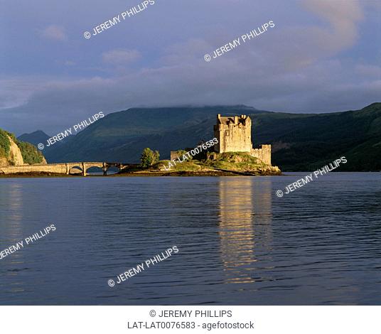 Eilean Donan castle on an island in Loch Duich is only accessible across a causeway bridge. It is a tall square building and a very popular location for...