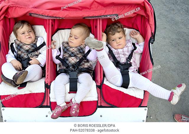 Triplets Alama, Olympia und Donata (l-r) attend the traditional triplets meeting in Neu-Anspach, Germany, 20 September 2014