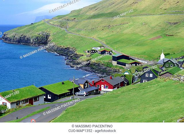 The small village of Bour (Boeur), at Sorvagsfjordur. The island Vagar, part of the Faroe Islands in the North Atlantic. Faroe Islands, Denmark, Europe