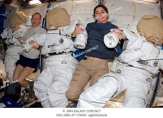 European Space Agency astronaut Frank De Winne, Expedition 21 commander; and NASA astronaut Nicole Stott, flight engineer