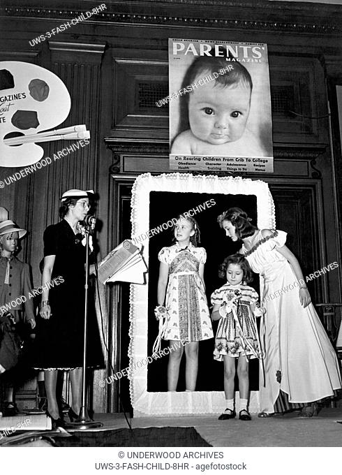 New York, New York: January 17, 1939 Young models wearing the latest in spring styles at the children's fashion show at the Hotel Pennsylvania