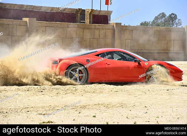 The Ferrari 458 driven by the driver who holds the two world speed records Fabio Barone, challenges in the suggestive Arena of the original Circus of Maxentius...